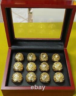 Set of 12 Old School World Series Baseball Rings. 20's-50's W Wooden Display Box